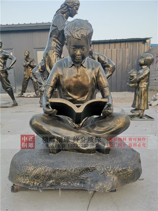 定做學生讀書雕塑.jpg