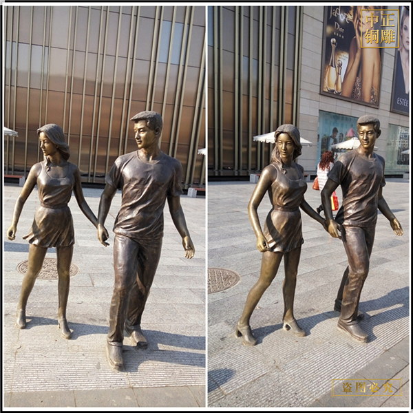 8商場門前情侶拉手銅雕塑.jpg